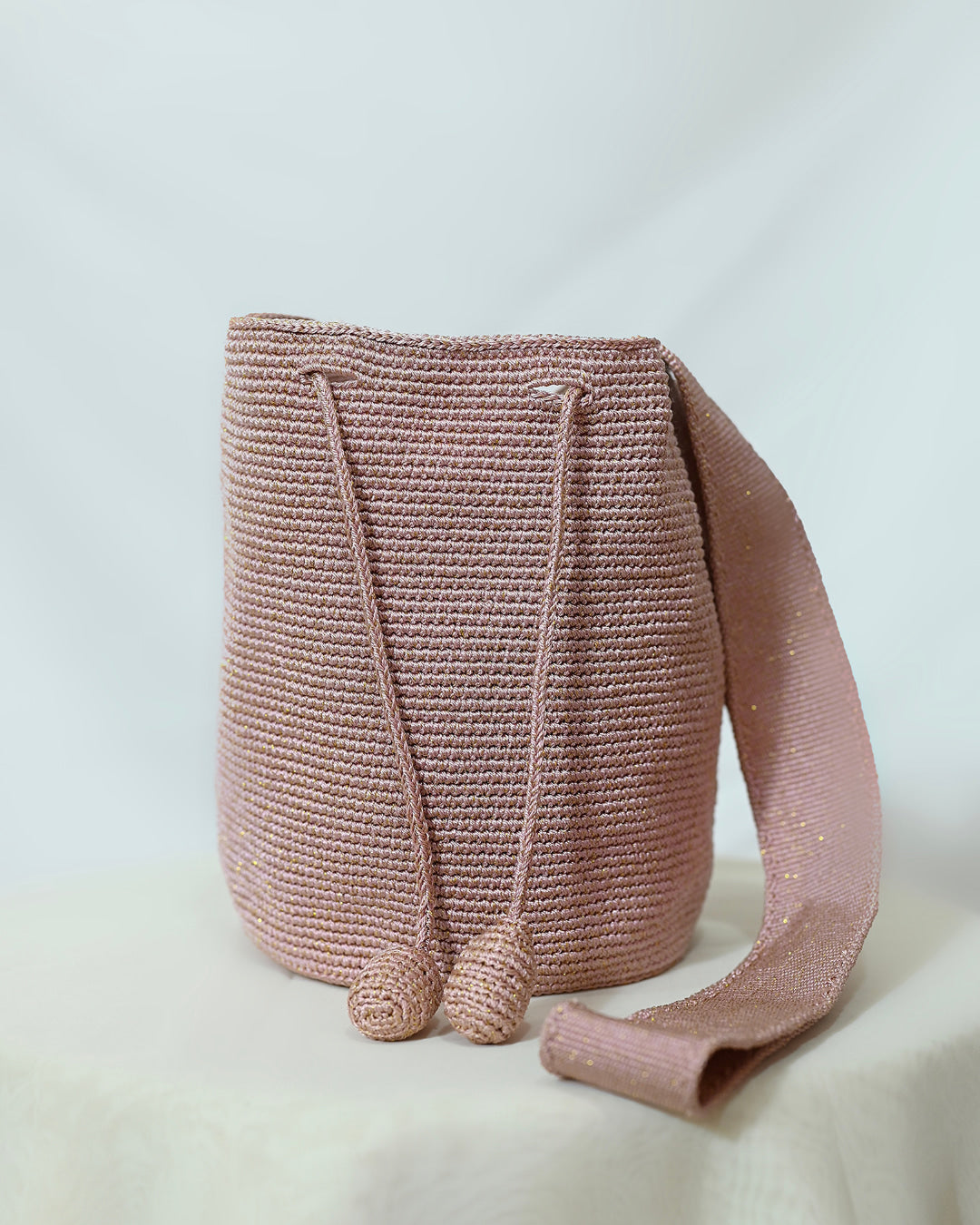 Mochila brillo sedoso oro rosa