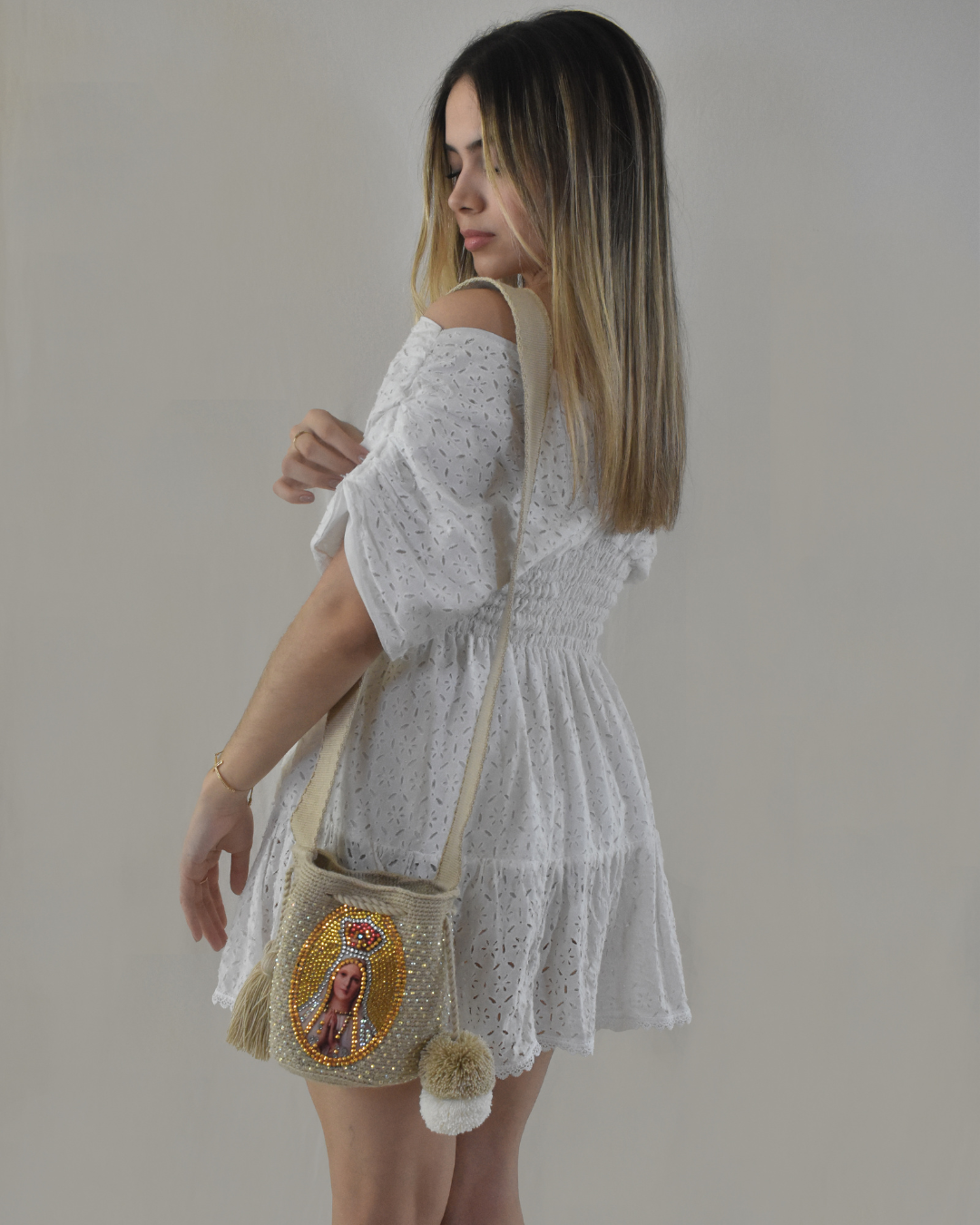 Mochila de la virgen de Fátima fondo dorado